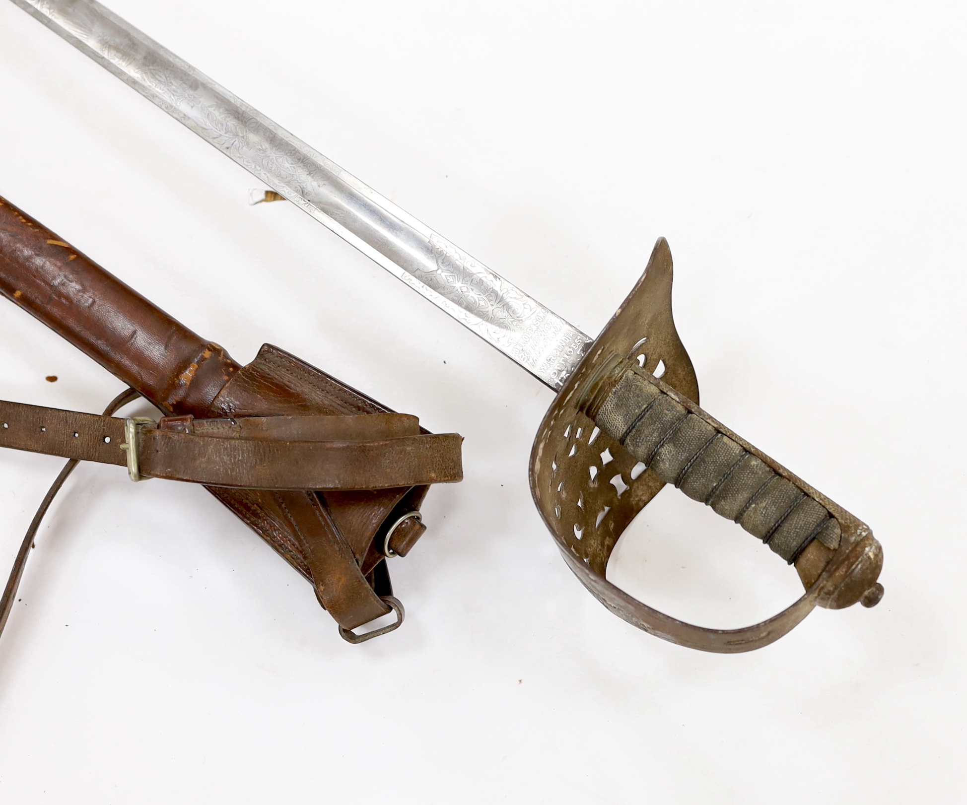 A Victorian 1897 pattern infantry officer's sword, maker Robert Mole & Sons, Birmingham, marked War and India offices, with scabbard and leather hanger, blade 82cm